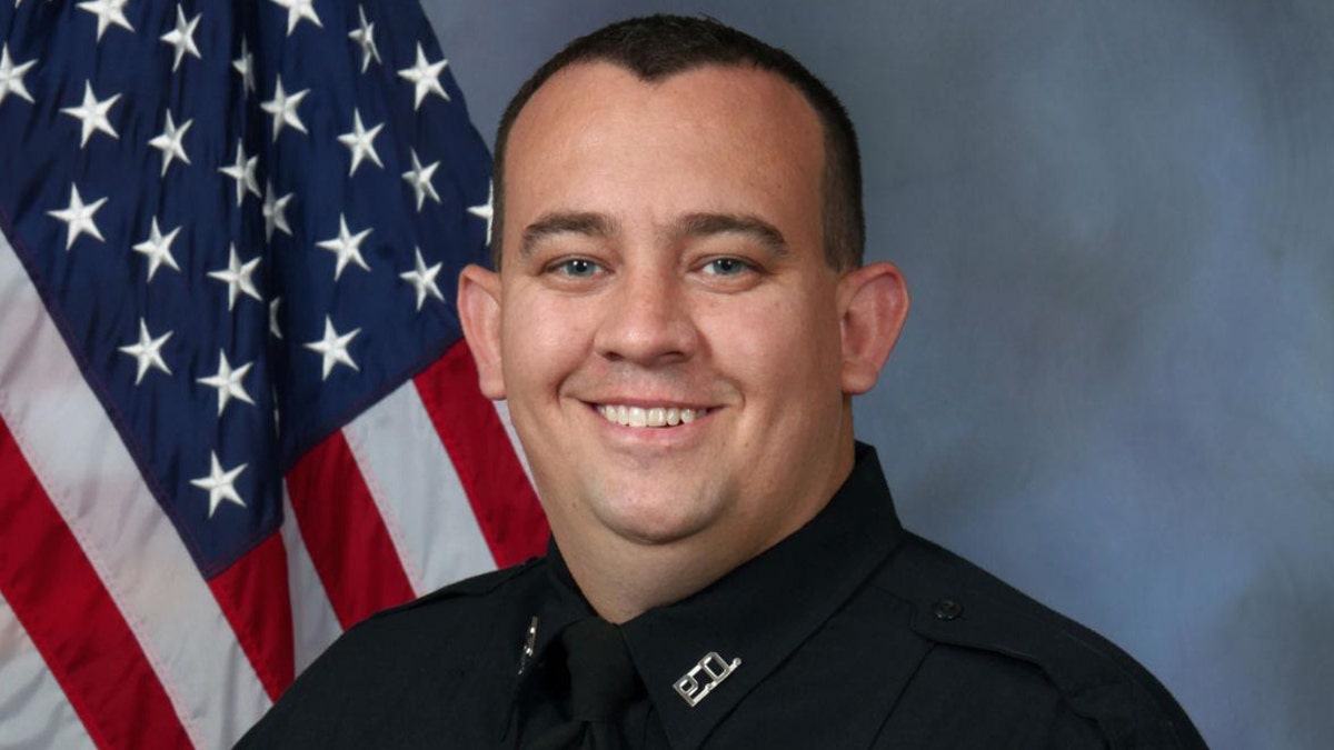 Overland Park Police Officer Mike Mosher died Sunday after suffering injuries in a shootout with a hit-and-run suspect, investigators say.
