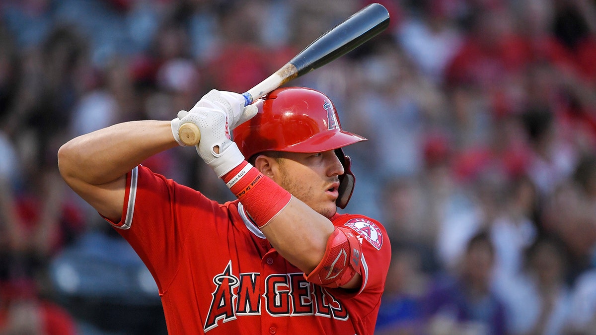 In this July 25, 2019, file photo, Los Angeles Angels' Mike Trout bats during the first inning of the team's baseball game against the Baltimore Orioles in Anaheim, California. (AP Photo/Mark J. Terrill, File)