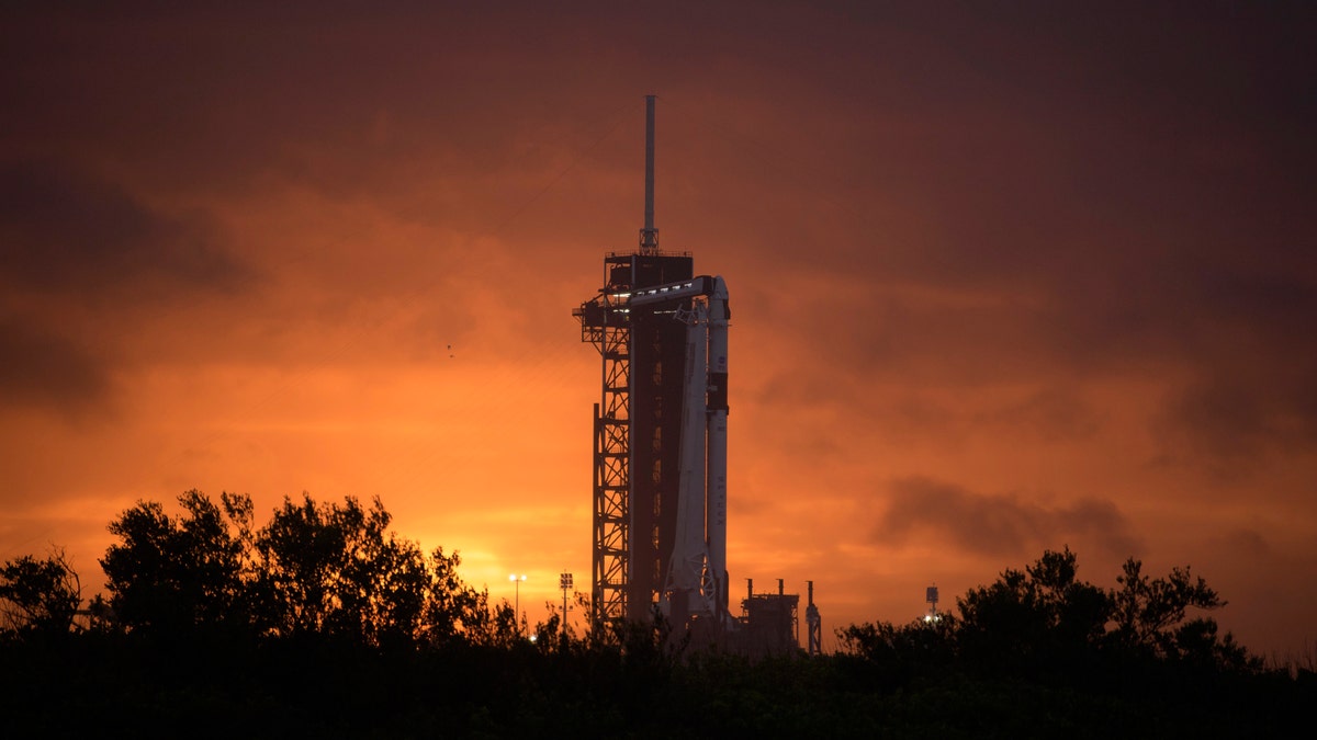 A SpaceX Falcon 9 rocket with the company's Crew Dragon spacecraft onboard is seen on the launch pad at Launch Complex 39A as preparations continue for the Demo-2 mission at NASA's Kennedy Space Center in Cape Canaveral, Fla., Monday, May 25, 2020.
