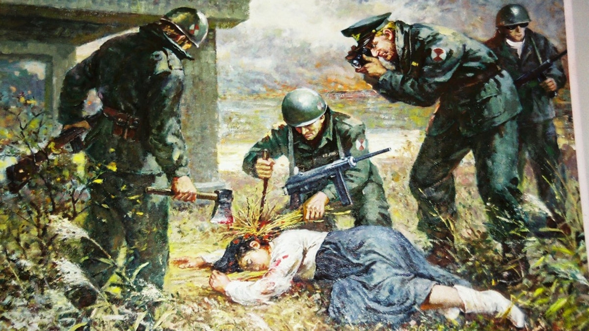 A painting displayed at a North Korean museum showing Westerners attacking a Korean girl.