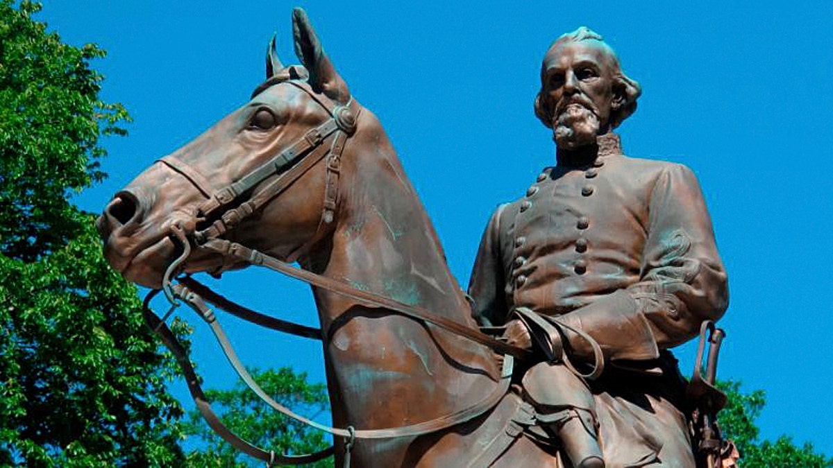 In this Aug. 18, 2017, photo, a statue of Confederate Gen. Nathan Bedford Forrest sits in a park in Memphis, Tenn. A city council in Tennessee plans to consider four different ways to deal with the growing uproar over the existence of two statues of Confederate leaders at city parks. (AP Photo/Adrian Sainz, File)