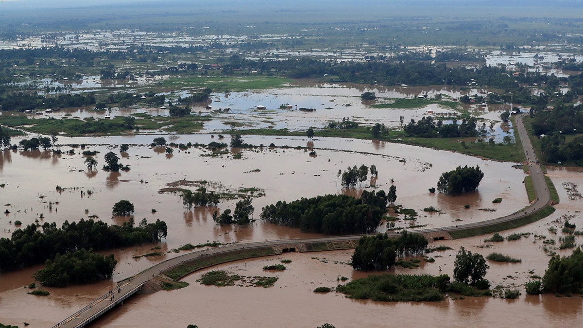 An aerial view shows flood waters near the Sigiri bridge, after River Nzoia burst its banks and due to heavy rainfall and the backflow from Lake Victoria, in Budalangi within Busia County, Kenya May 3.