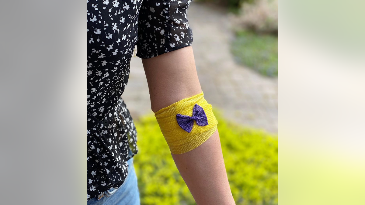 A woman donates blood as an act of kindness, so Stand Together will donate $500 dollars to a family in need during COVID-19 pandemic.