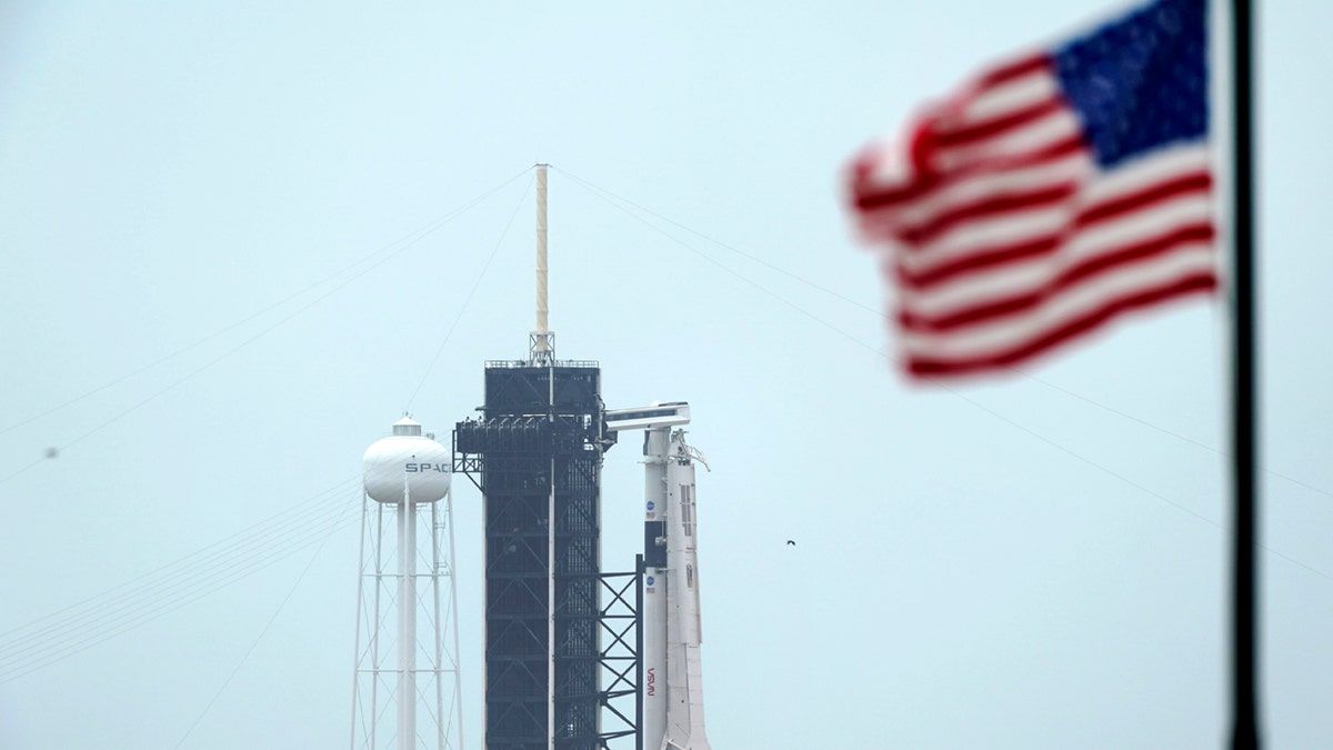 The SpaceX Falcon 9, with the Crew Dragon spacecraft on top of the rocket, sits on Launch Pad 39-A May 25, at Kennedy Space Center, Fla.