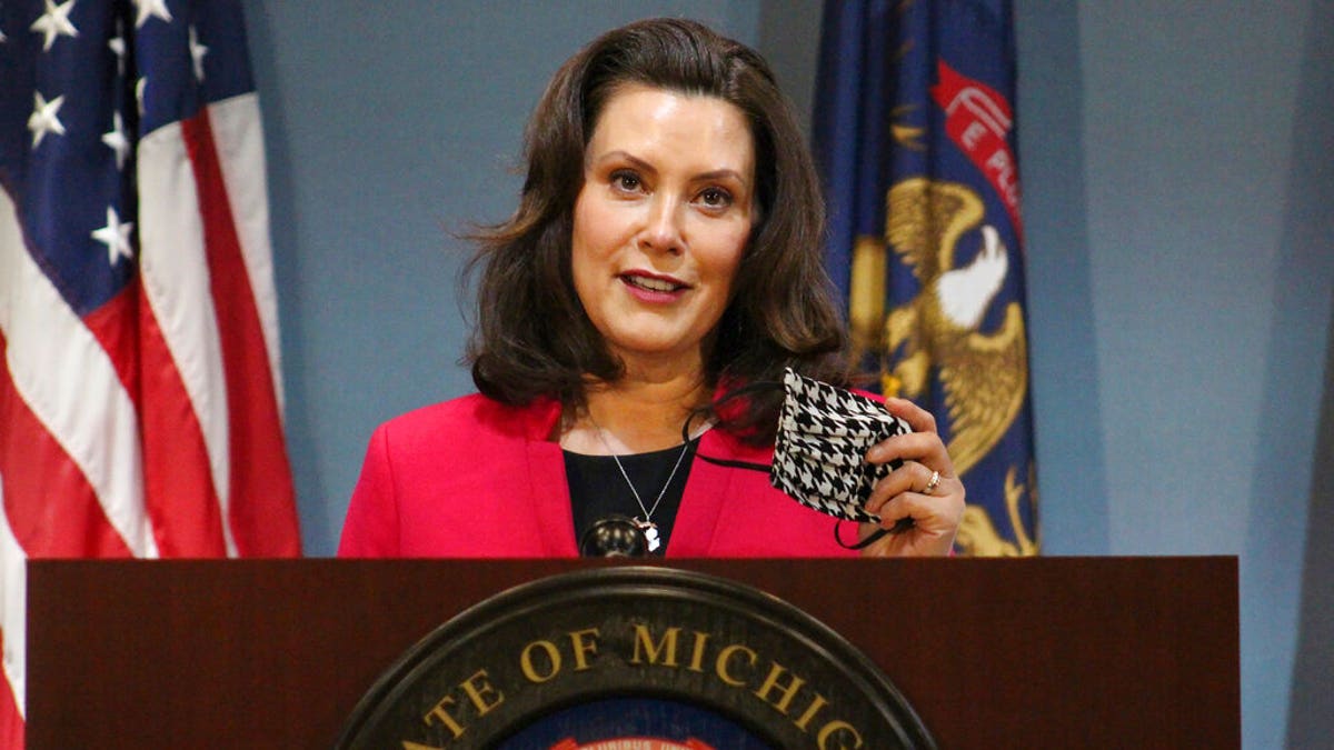 Whitmer speaks during a news conference in Lansing, Mich. (Michigan Office of the Governor via AP, Pool)