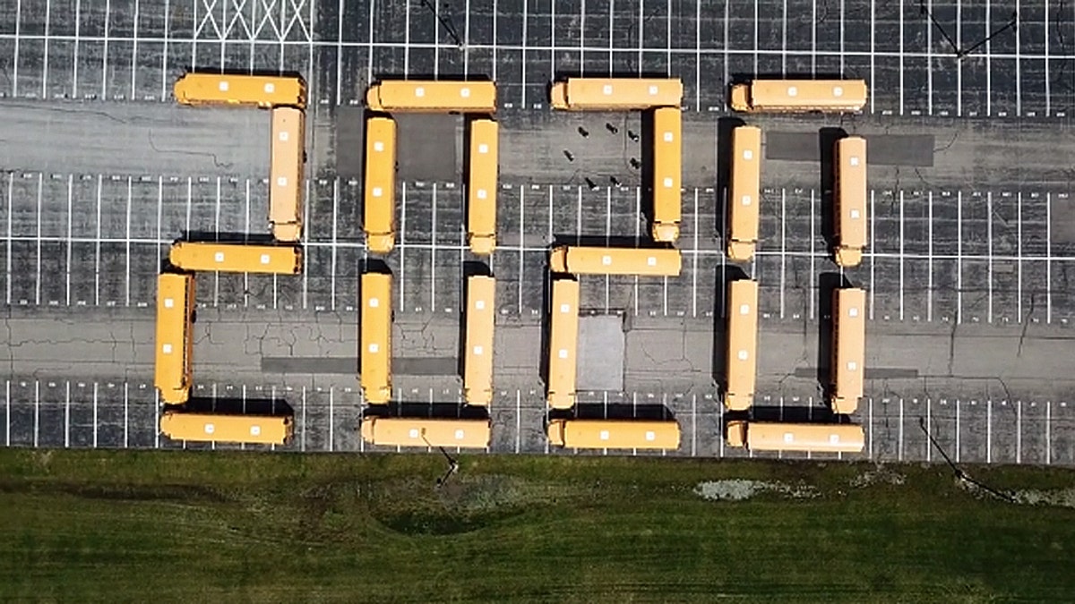 Because they won’t get to say goodbye in person, the drivers parked 22 buses to read “2020” and waved farewell to wish the kids well last week.