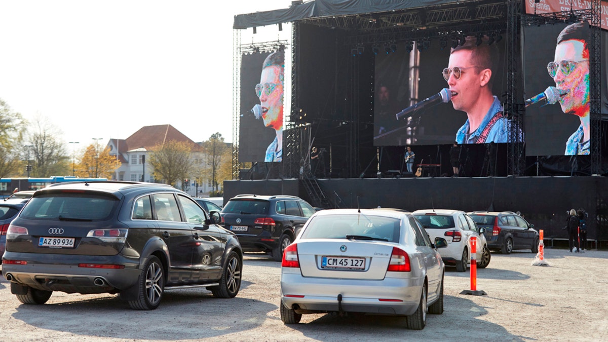 Danish singer and songwriter Mads Langer preforms at a sold-out drive-in concert at Tangkrogen in Aarhus, Denmark on April 24, 2020. (Photo by Mikkel Berg Pedersen / Ritzau Scanpix / AFP) / Denmark OUT (Photo by MIKKEL BERG PEDERSEN/Ritzau Scanpix/AFP via Getty Images)