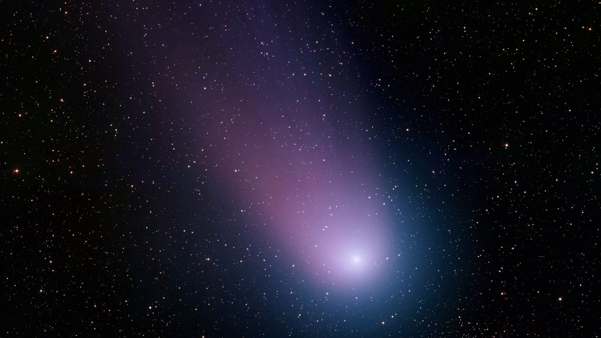 File photo - The Kitt Peak National Observatory in Arizona captured this image of Comet NEAT on May 7, 2004.