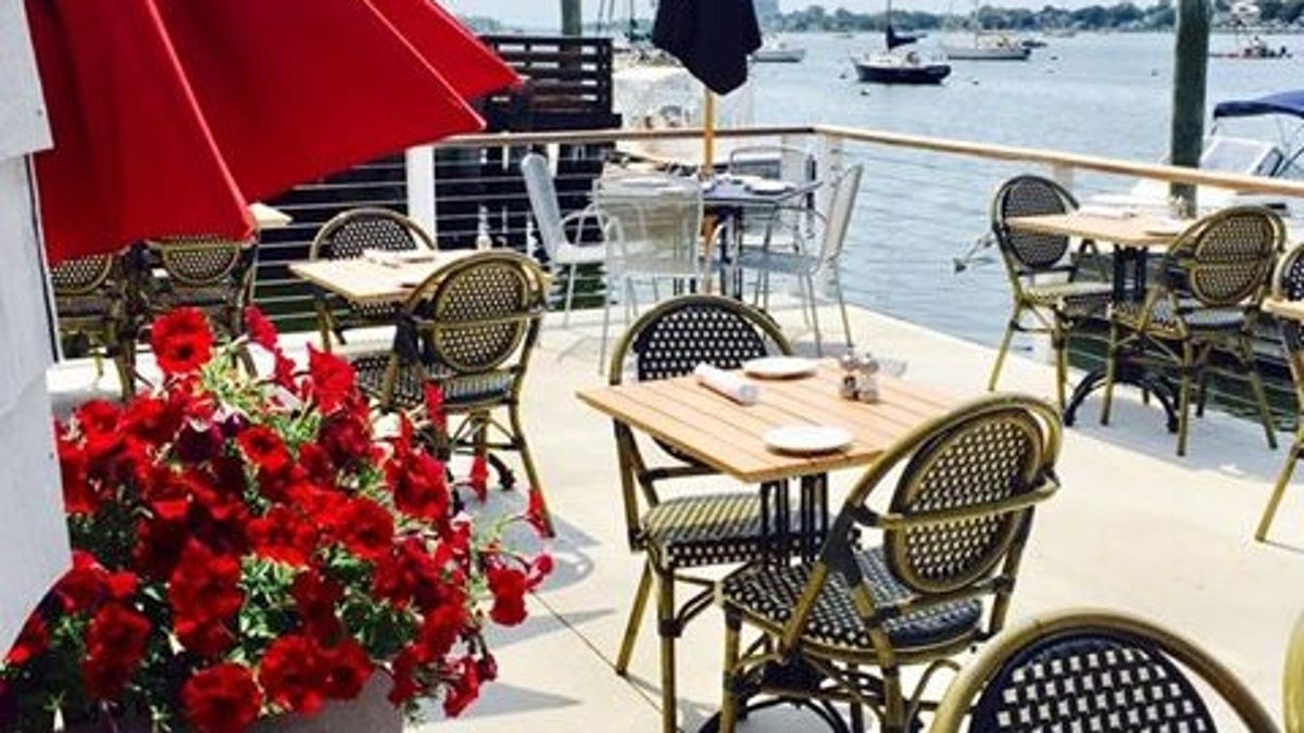 Harbor Lights, which serves seafood along Norwalk's waterfront, is one of the restaurants in Connecticut reopening its outdoor dining areas today. 