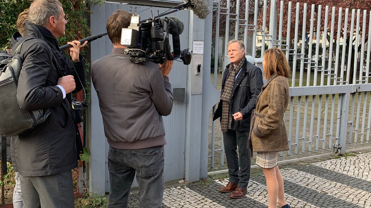 Cindy and Fred Warmbier speak to reporters outside the City Hostel Berlin, which is said to be an illegal money-maker for North Korea.