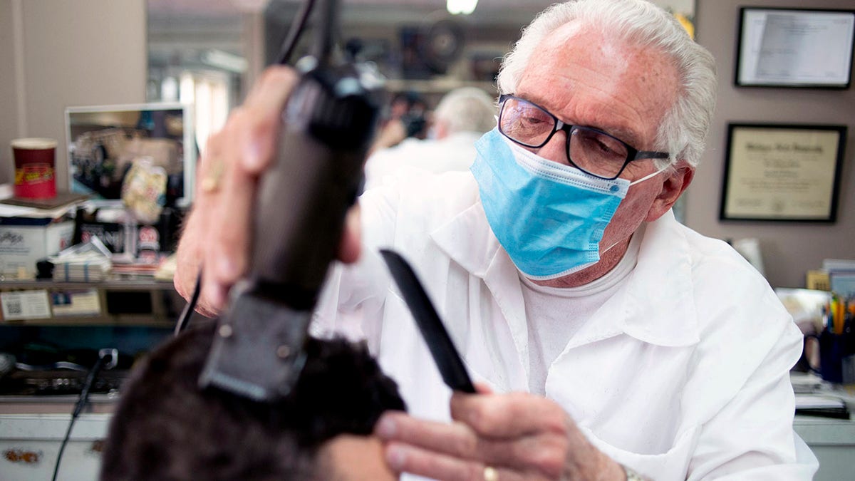 Manke reopened his shop May 4 after money became tight. (Jake May/The Flint Journal via AP)