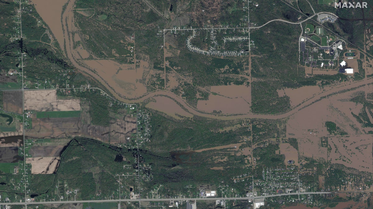 Flooding along the Tittabawassee River in central Michigan as seen in this satellite photo from Maxar on Thursday.