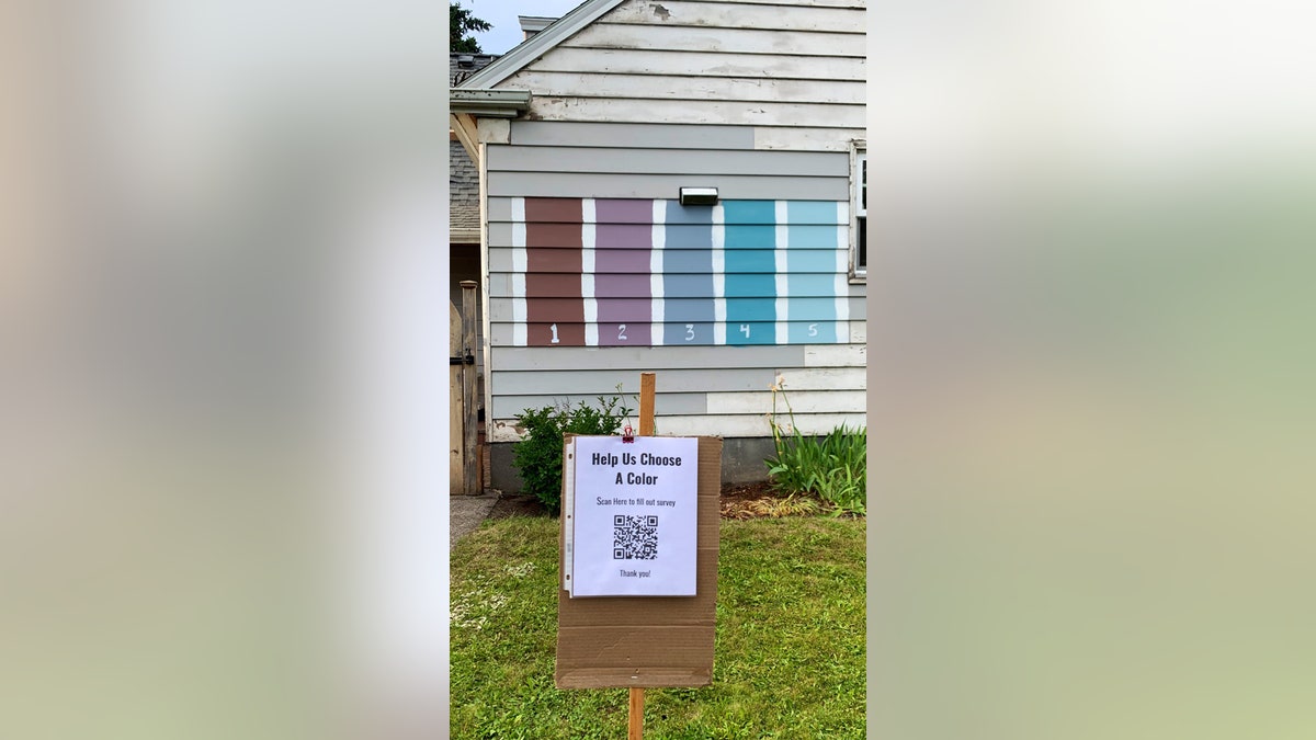 The Landreth family of Portland recently painted five colors on the side of their house and created a QR code, pictured, for middle schooler Grace's school project about documenting data.