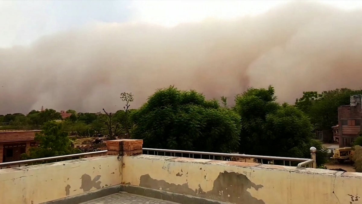 A video grab from the frightening moment a giant sandstorm looms and slowly engulfs the city of Rajasthan, northern India. May 17 2020.