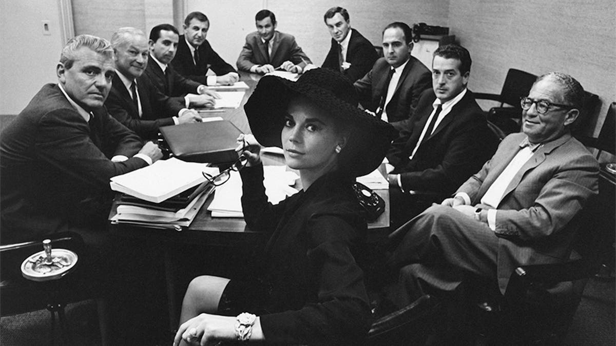 Natalie Wood in a business meeting.