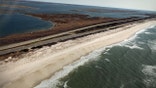WANTAGH, NY - APRIL 15:  An aerial view of the area near Gilgo Beach and Ocean Parkway on Long Island where police have been conducting a prolonged search after finding ten sets of human remains on April 15, 2011 in Wantagh, New York. Of the ten only four sets of remains have been identified as missing female prostitutes in their 20s who had been working in the online escort business. Police, working with the Federal Bureau of Investigation (FBI), suspect that a single serial killer may be in the New York area focusing on sex workers. (Photo by Spencer Platt/Getty Images)