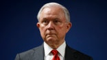 FILE - In this Oct. 15, 2018, file photo, Attorney General Jeff Sessions pauses during a news conference at the U.S. Attorney's Office for the District of Columbia in Washington. (AP Photo/Carolyn Kaster, File)