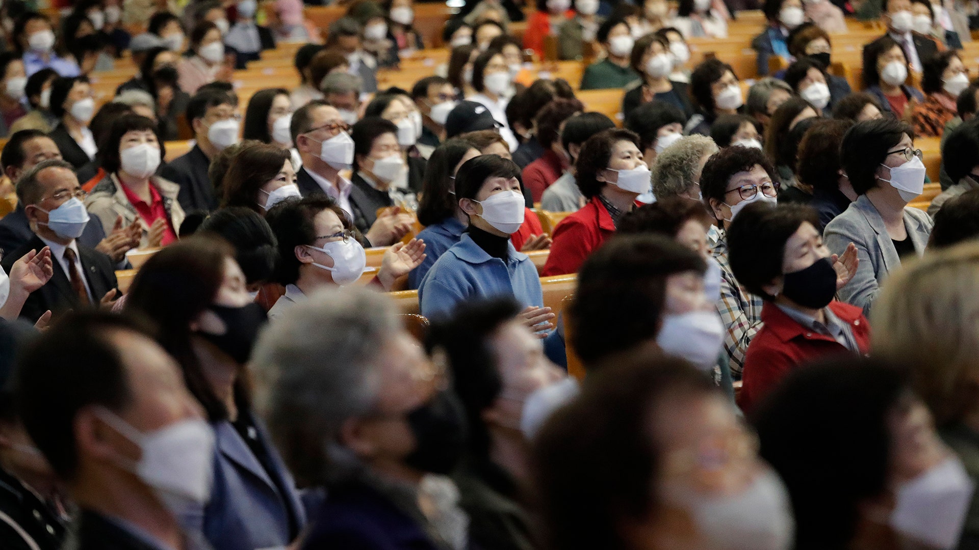 Christians wearing face masks attend a service at the Yoido Full Gospel Church in Seoul, South Korea, May 10, 2020. 