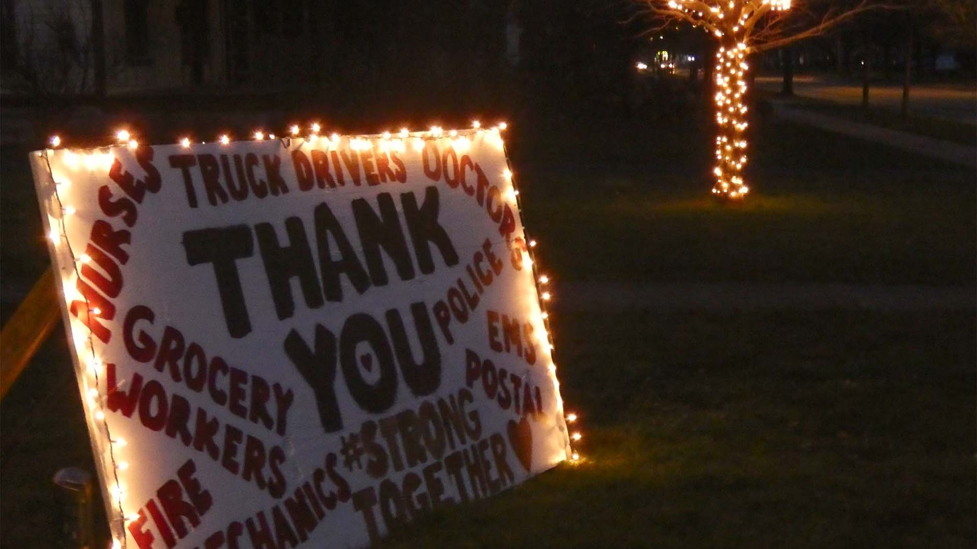 Our family decided to put together a sign thanking those working to keep our country together. We lit it up for those going by in the night time hours. We will get through this together.