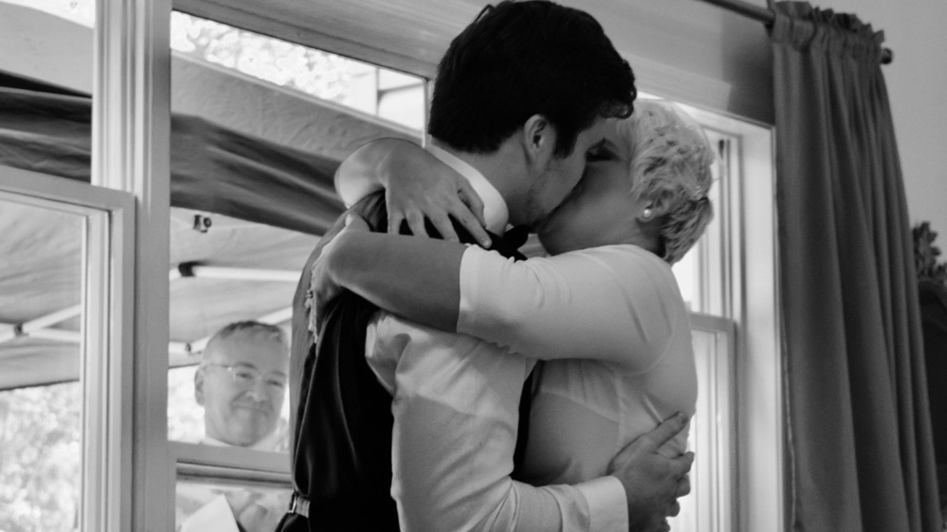 I want to share our beautiful wedding story with you. We were supposed to get married with 250 guests around us in our home parish. We planned on a beautiful reception at a vineyard in Maryland. God had other plans for us, we were able to get a marriage license and have a beautiful ceremony in our living room with our priest outside the window and our photographer out a side window. We Facebook lived the whole thing and 900 plus family members, friends and strangers were able to join us in witnessing hope and love in this pandemic. We want to share our story to show how God’s plan is more beautiful than we know. There is beauty in these ashes. Thank you, Lacie and Christian Winkle