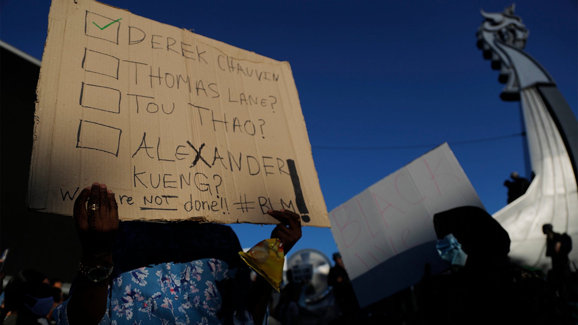 Protesters gather outside U.S. Bank Stadium in Minneapolis Friday.