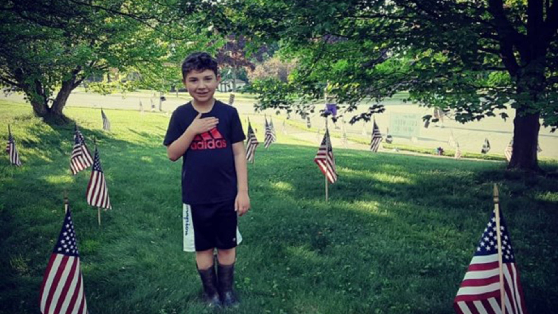 My husband, Les Brody is a veteran of the U.S. Navy. Like most veterans he doesn't take this title lightly. He teaches our three grandchildren about perseverance, honesty, loyalty, helping others and heroes...real heroes. As a Memorial Day tribute to all veterans, and particularly to those that made the ultimate sacrifice, we placed 50 flags in our front yard..one for veterans from each state.. and 11 more USA and POW flags up the sidewalk in front of our house. Our daughter, son-in-law and 3 grandchildren came over our house to visit...outside...on Memorial Day....maintaining social distance. Our daughter, Jessica, took this picture of our youngest grandson, Ethan. The caption on this Instagram says it all. God Bless America. Thank you, Denise Brody