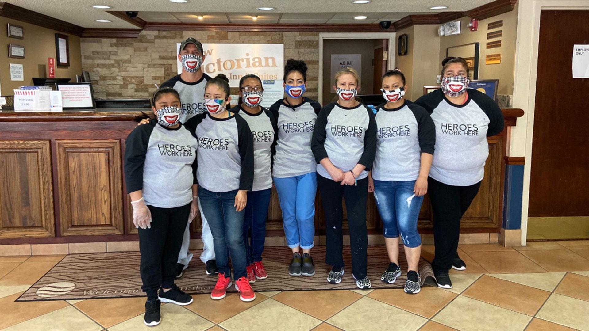 This picture represent the staff at the New Victorian Inn and Suites in Omaha Nebraska. We strive to keep our guests happy and do everything we can to keep them safe from the virus. Many people stay with us a lot and call us home away from home. We are happy that our doors have been able to stay open and continue to serve not only our wonderful guests coming through but also many truck drivers who rely on a place to be able to get much needed rest and a hot shower. As employees of this great company we are more than proud to wear our hero shirts and help those who need it.