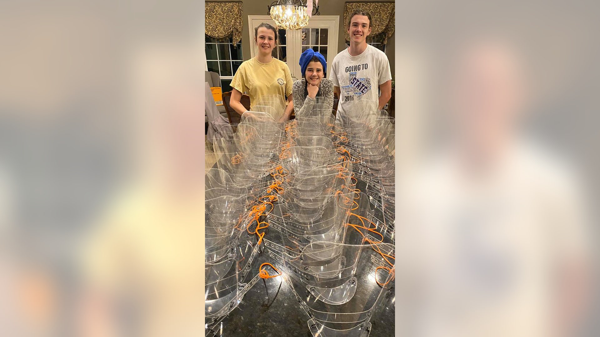 AMERICA TOGETHER FEEL GOOD PIC OF KIDS MAKING 110 MASKS FOR FIRST RESPONDERS