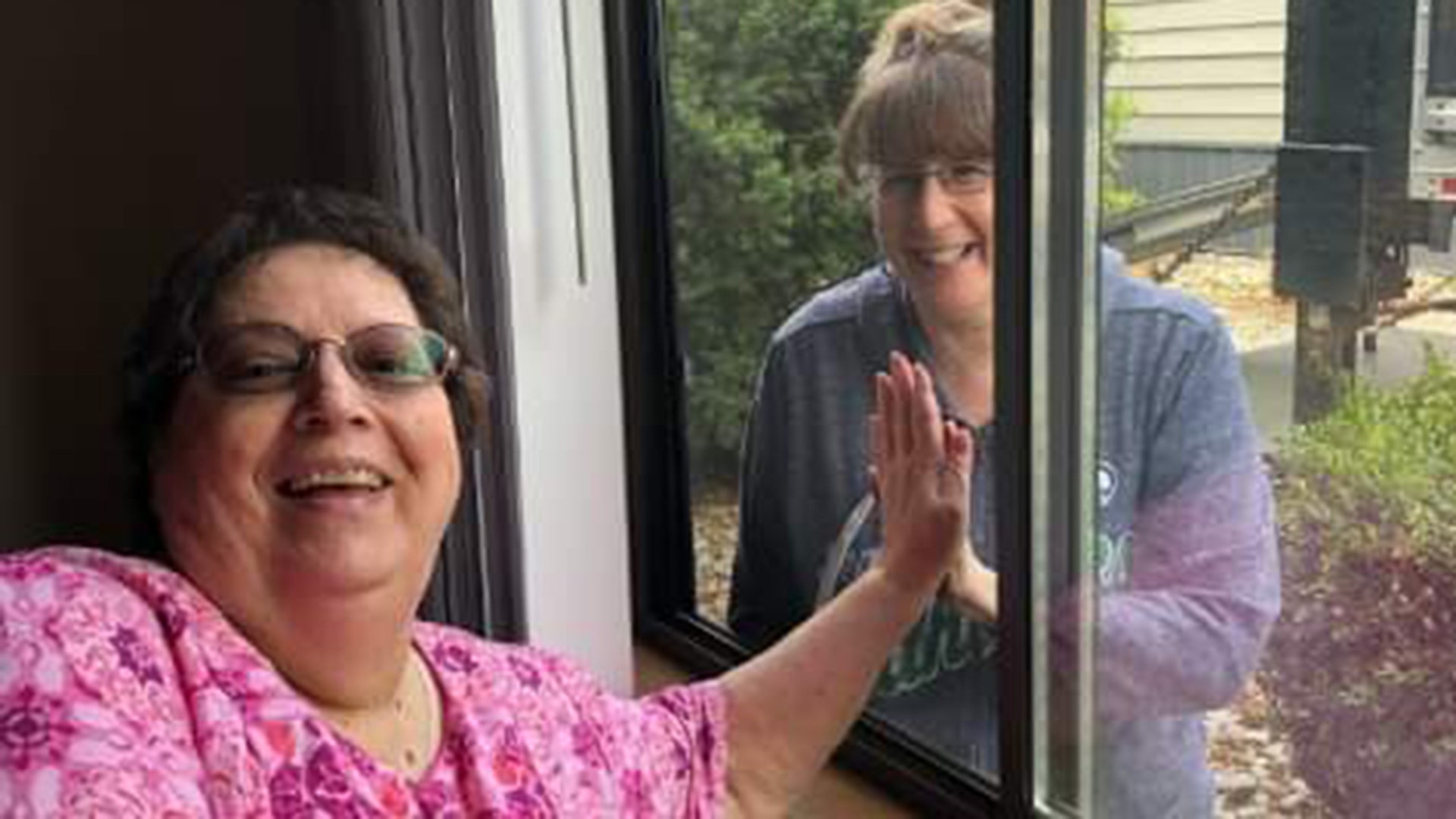 My mother, Mary Kane, lives in an Independent Senior Living facility in Coeur d'Alene Idaho. She's very lonely as my dad as passed on. My sister, Lori Mosqueda, and her family live in a nearby town. Despite the fact that my sister is battling stage 4 breast cancer, she came into town just so our mom didn't feel so alone. They may not have been able to hug through the window, but the love between mother and daughter still shines through. My mom's aide took this photo. It breaks my heart, while at the same time uplifts it. Lisa Kane University Place Wa