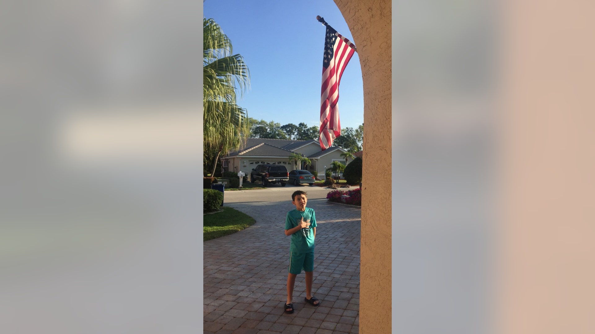 Here is our grandson Aiden Miller of Naples Florida doing pledge to flag before starting his homeschooling day.