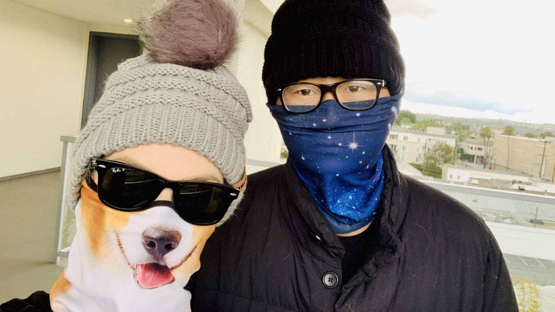 My husband and I making the most of the directive to wear masks while grabbing takeout in Los Angeles. :) -Sara &amp; Dan L.