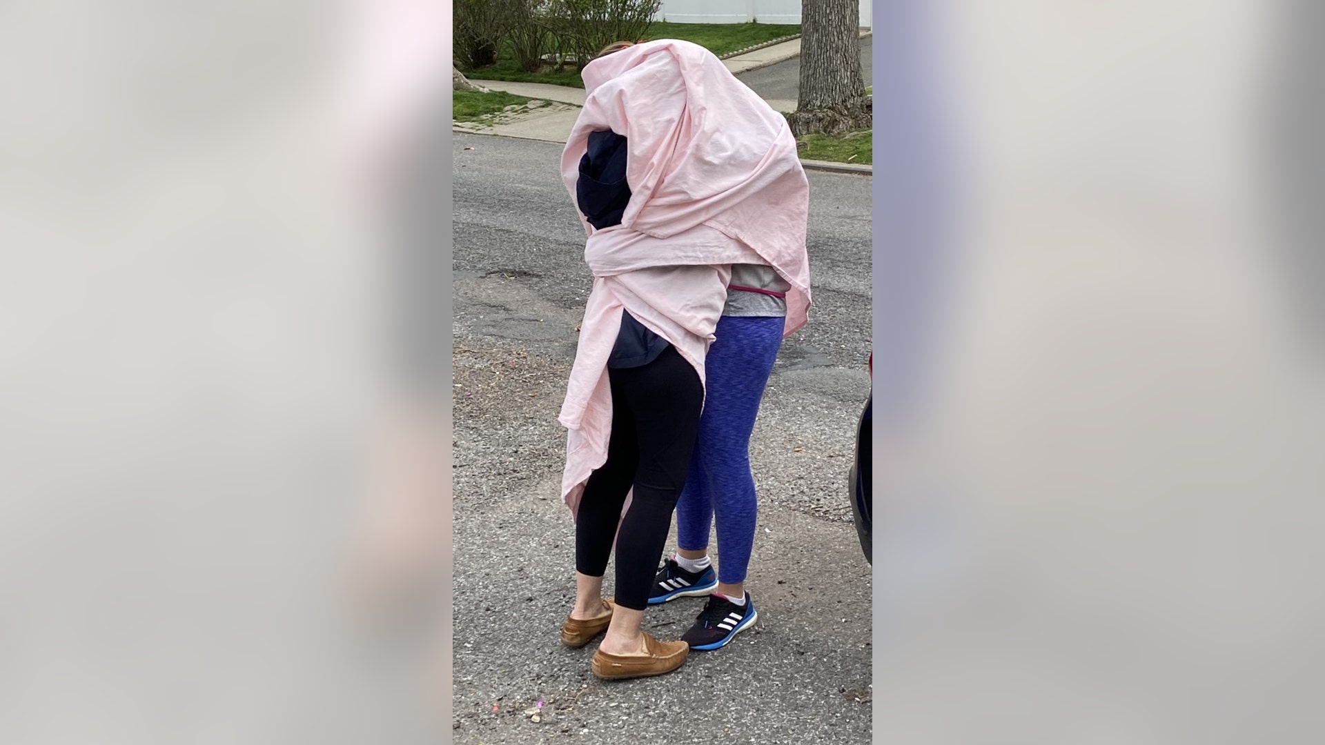 This is a photo of my daughter Jackie, a RN working in NYU Hospital, giving s birthday hug to her mom, who is a retired nurse. It was the first contact in over a month and only after my daughter was tested negative for COVID, even so they hugged through a sheet