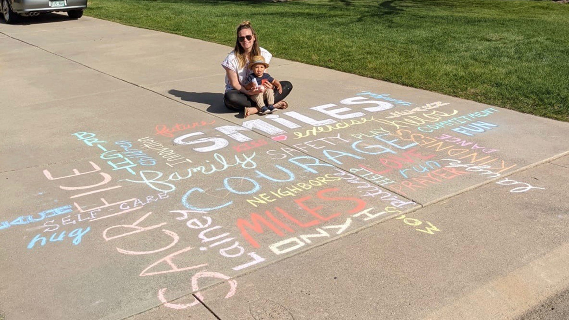 The chalk art of Lainey and family in Lakewood Colorado encouraging everyone to hang in there