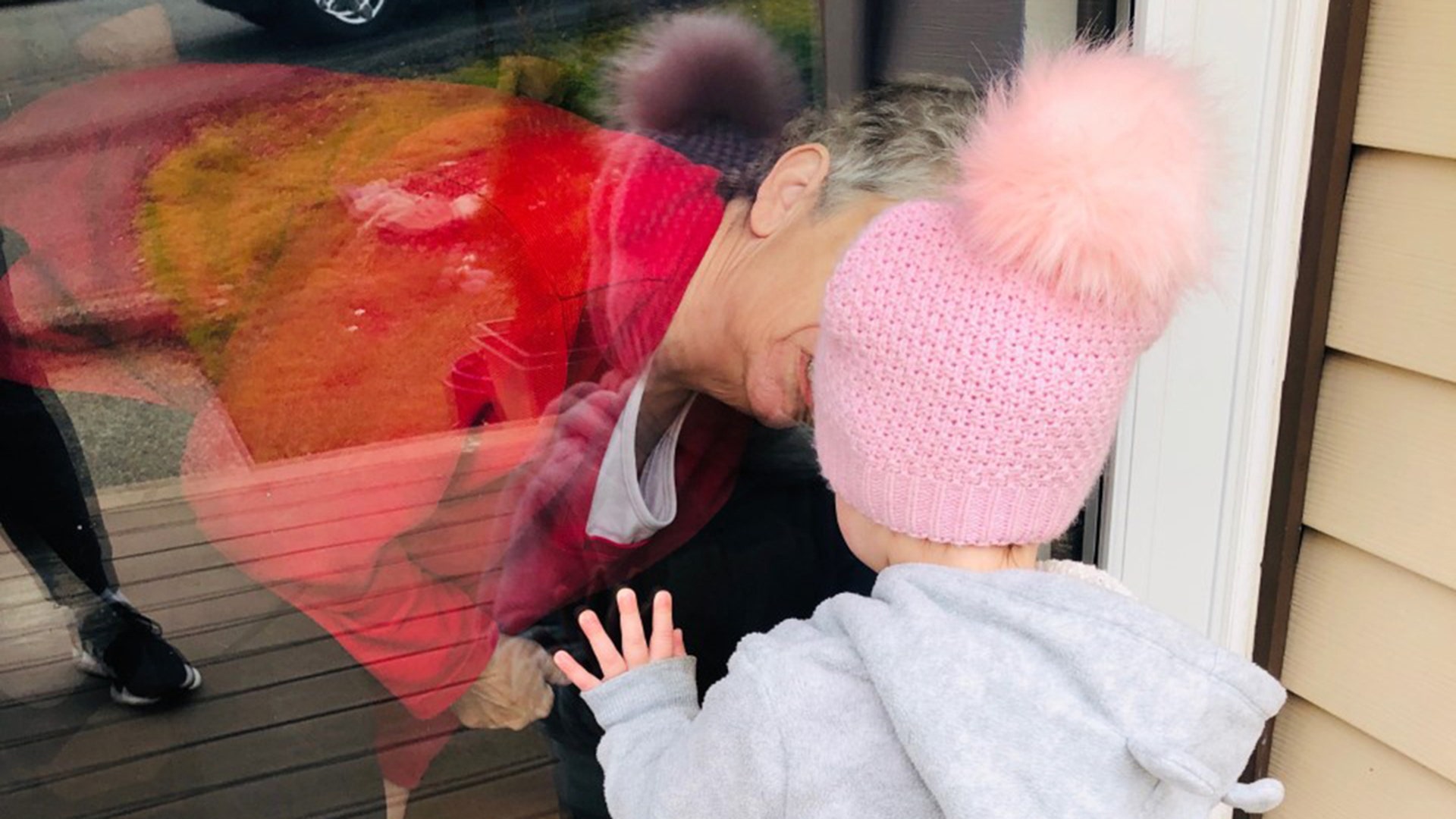 A picture of a grandmother practicing due diligence and saying "Hello" to her darling granddaughter during our "maintain your distancing" guideline. To use the vernacular, the show of love "don't get no better" than this: