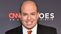 Brian Stelter’s CNN show hits another low in key demo, promotional thigh-exposing pic doesn’t draw viewers