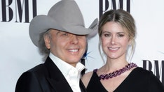 Country star Dwight Yoakam marries fiancée Emily Joyce in socially distant wedding