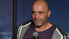 Joe Rogan's podcast debuts on Spotify with controversial episodes missing