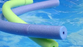 German cafe gives swimming pool noodle hats to diners to ensure social distancing