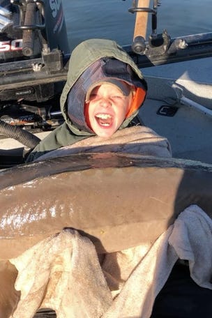 Little kid catches massive fish
