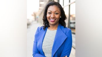 Michigan state representative escorted to work by armed guards as coronavirus measures spark protests