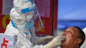 Coronavirus patients in new Chinese cluster exhibiting symptoms different from Wuhan