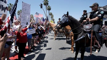 Huntington Beach protesters assail California Gov. Newsom's order closing beaches