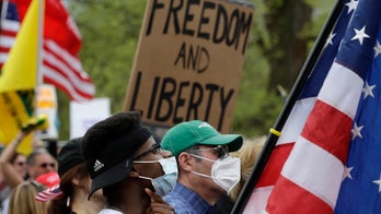 Hundreds in Boston rally against Massachusetts' coronavirus restrictions