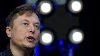 Elon Musk calls 'Jeopardy!' champ Ken Jennings a 'knucklehead' over 'arrest' joke