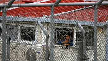 Greek migrant center near Turkish border sees violent protests as coronavirus sparks delays