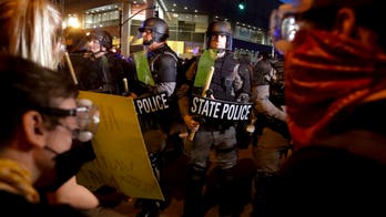 Louisville police apologize after firing pepper bullets at news crew during live broadcast