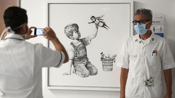 Banksy surprise: New work from mysterious artist appears at UK hospital amid coronavirus outbreak