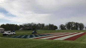 Indiana man paints enormous US flag on field to honor coronavirus health workers