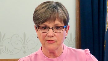 Kansas' Dem governor vetoes GOP bill to limit her coronavirus emergency powers