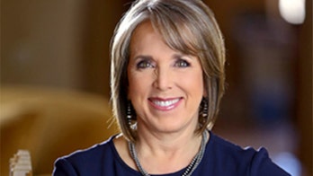 New Mexico governor nixes door-knocking, but not protests — then clarifies